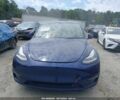 Синий Тесла Model Y, объемом двигателя 0 л и пробегом 96 тыс. км за 17350 $, фото 1 на Automoto.ua