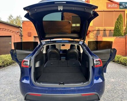 Синий Тесла Model Y, объемом двигателя 0 л и пробегом 90 тыс. км за 22300 $, фото 19 на Automoto.ua