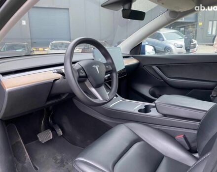 Синій Тесла Model Y, об'ємом двигуна 0 л та пробігом 91 тис. км за 25990 $, фото 8 на Automoto.ua
