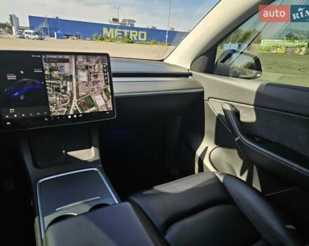 Синий Тесла Model Y, объемом двигателя 0 л и пробегом 53 тыс. км за 23500 $, фото 25 на Automoto.ua