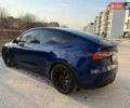 Синий Тесла Model Y, объемом двигателя 0 л и пробегом 99 тыс. км за 22900 $, фото 1 на Automoto.ua