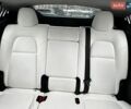 Синий Тесла Model Y, объемом двигателя 3 л и пробегом 150 тыс. км за 20000 $, фото 1 на Automoto.ua