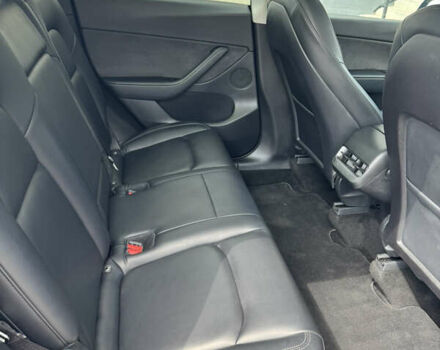 Синий Тесла Model Y, объемом двигателя 0 л и пробегом 83 тыс. км за 24999 $, фото 23 на Automoto.ua