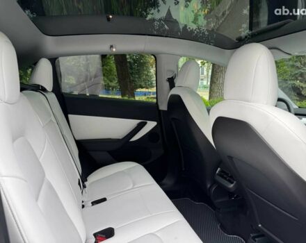 Синій Тесла Model Y, об'ємом двигуна 0 л та пробігом 86 тис. км за 19390 $, фото 24 на Automoto.ua