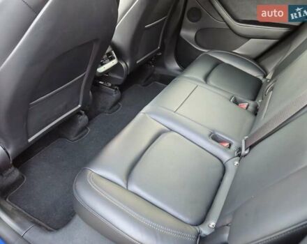 Синий Тесла Model Y, объемом двигателя 0 л и пробегом 99 тыс. км за 25900 $, фото 27 на Automoto.ua