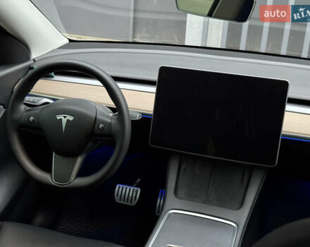 Синий Тесла Model Y, объемом двигателя 0 л и пробегом 88 тыс. км за 31990 $, фото 42 на Automoto.ua