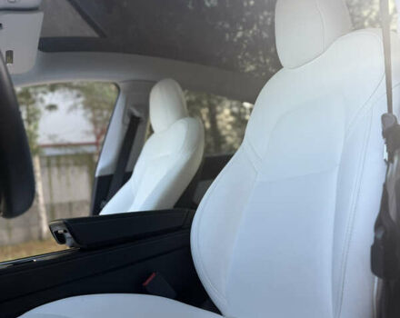 Синий Тесла Model Y, объемом двигателя 0 л и пробегом 97 тыс. км за 26500 $, фото 16 на Automoto.ua