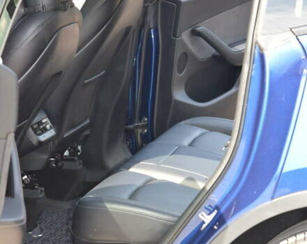 Синий Тесла Model Y, объемом двигателя 0 л и пробегом 81 тыс. км за 25499 $, фото 29 на Automoto.ua