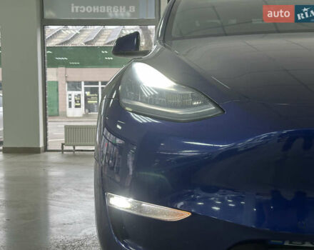 Синий Тесла Model Y, объемом двигателя 0 л и пробегом 122 тыс. км за 27500 $, фото 2 на Automoto.ua