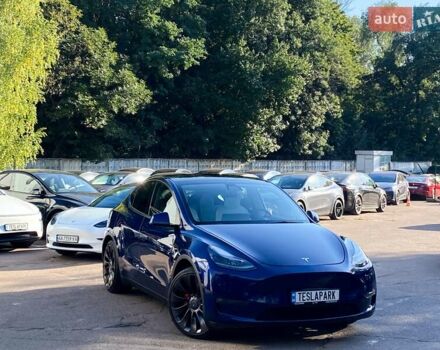 Синий Тесла Model Y, объемом двигателя 0 л и пробегом 92 тыс. км за 31999 $, фото 1 на Automoto.ua