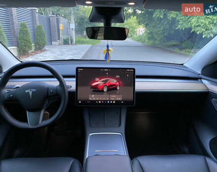 Синий Тесла Model Y, объемом двигателя 0 л и пробегом 54 тыс. км за 26800 $, фото 22 на Automoto.ua