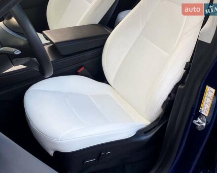 Синий Тесла Model Y, объемом двигателя 0 л и пробегом 92 тыс. км за 31999 $, фото 12 на Automoto.ua