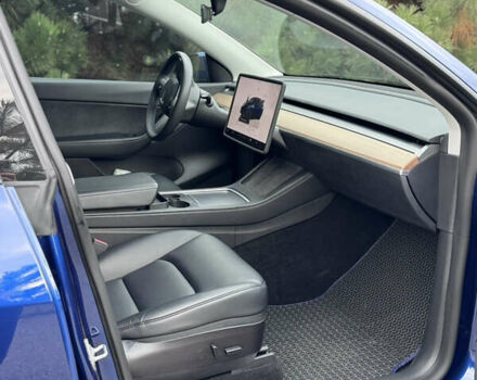 Синий Тесла Model Y, объемом двигателя 0 л и пробегом 52 тыс. км за 30900 $, фото 33 на Automoto.ua