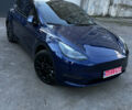 Синій Тесла Model Y, об'ємом двигуна 0 л та пробігом 76 тис. км за 23300 $, фото 1 на Automoto.ua