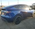 Синий Тесла Model Y, объемом двигателя 0 л и пробегом 33 тыс. км за 23200 $, фото 5 на Automoto.ua