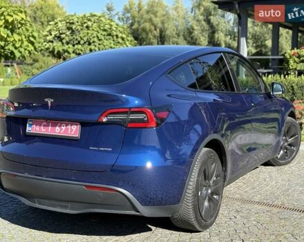 Синий Тесла Model Y, объемом двигателя 0 л и пробегом 80 тыс. км за 25300 $, фото 56 на Automoto.ua