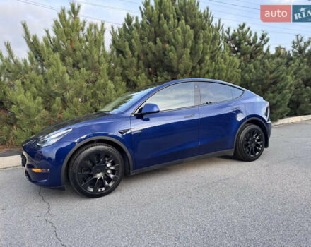Синий Тесла Model Y, объемом двигателя 0 л и пробегом 52 тыс. км за 30900 $, фото 2 на Automoto.ua