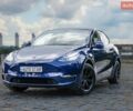 Синий Тесла Model Y, объемом двигателя 0 л и пробегом 74 тыс. км за 28000 $, фото 1 на Automoto.ua