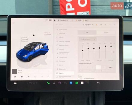 Синий Тесла Model Y, объемом двигателя 0 л и пробегом 92 тыс. км за 31999 $, фото 23 на Automoto.ua