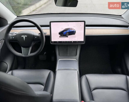 Синий Тесла Model Y, объемом двигателя 0 л и пробегом 52 тыс. км за 30900 $, фото 29 на Automoto.ua