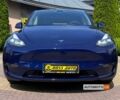 Синий Тесла Model Y, объемом двигателя 82 л и пробегом 71 тыс. км за 28700 $, фото 1 на Automoto.ua