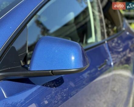 Синий Тесла Model Y, объемом двигателя 0 л и пробегом 80 тыс. км за 25300 $, фото 17 на Automoto.ua