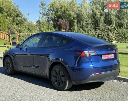Синий Тесла Model Y, объемом двигателя 0 л и пробегом 80 тыс. км за 25300 $, фото 30 на Automoto.ua