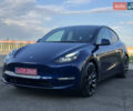 Синий Тесла Model Y, объемом двигателя 0 л и пробегом 61 тыс. км за 23800 $, фото 1 на Automoto.ua