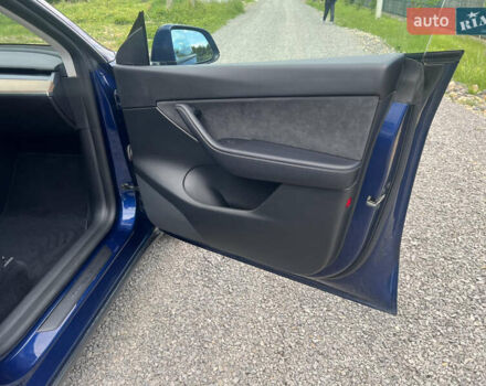 Синій Тесла Model Y, об'ємом двигуна 0 л та пробігом 91 тис. км за 23200 $, фото 20 на Automoto.ua