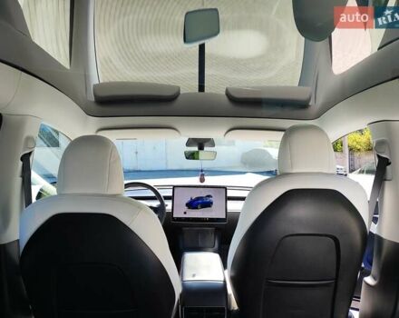 Синий Тесла Model Y, объемом двигателя 0 л и пробегом 63 тыс. км за 26800 $, фото 4 на Automoto.ua