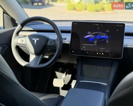 Синий Тесла Model Y, объемом двигателя 0 л и пробегом 80 тыс. км за 25300 $, фото 110 на Automoto.ua