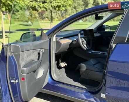 Синий Тесла Model Y, объемом двигателя 0 л и пробегом 80 тыс. км за 25300 $, фото 72 на Automoto.ua