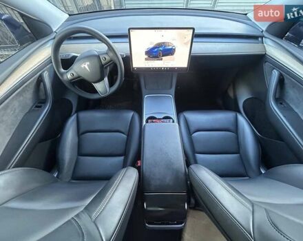Синий Тесла Model Y, объемом двигателя 0 л и пробегом 93 тыс. км за 25500 $, фото 7 на Automoto.ua