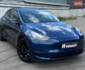 Синий Тесла Model Y, объемом двигателя 0 л и пробегом 47 тыс. км за 26999 $, фото 1 на Automoto.ua