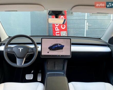 Синий Тесла Model Y, объемом двигателя 0 л и пробегом 92 тыс. км за 31999 $, фото 16 на Automoto.ua