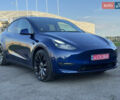 Синий Тесла Model Y, объемом двигателя 0 л и пробегом 61 тыс. км за 24900 $, фото 1 на Automoto.ua