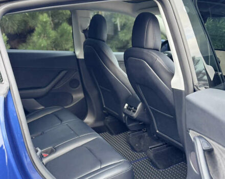 Синий Тесла Model Y, объемом двигателя 0 л и пробегом 52 тыс. км за 30900 $, фото 25 на Automoto.ua
