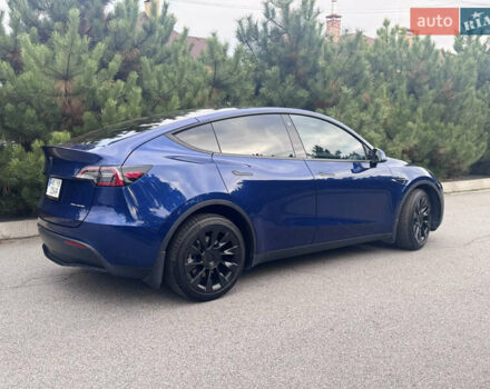 Синий Тесла Model Y, объемом двигателя 0 л и пробегом 52 тыс. км за 30900 $, фото 46 на Automoto.ua