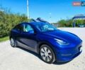 Синий Тесла Model Y, объемом двигателя 0 л и пробегом 63 тыс. км за 26800 $, фото 1 на Automoto.ua