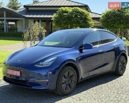 Синий Тесла Model Y, объемом двигателя 0 л и пробегом 80 тыс. км за 25300 $, фото 28 на Automoto.ua