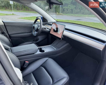 Синий Тесла Model Y, объемом двигателя 0 л и пробегом 61 тыс. км за 23800 $, фото 13 на Automoto.ua