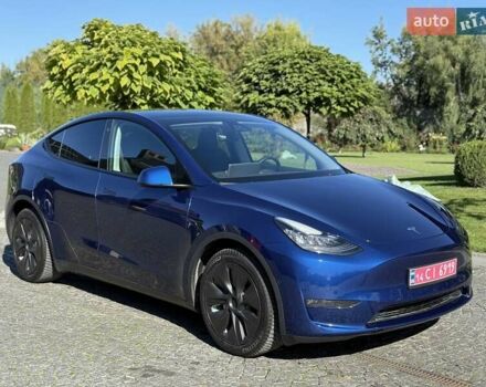 Синий Тесла Model Y, объемом двигателя 0 л и пробегом 80 тыс. км за 25300 $, фото 1 на Automoto.ua