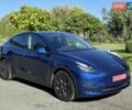Синий Тесла Model Y, объемом двигателя 0 л и пробегом 80 тыс. км за 25300 $, фото 1 на Automoto.ua