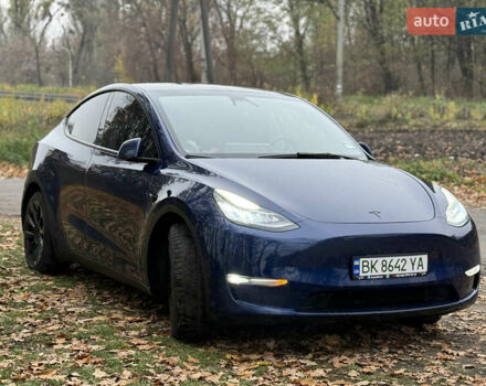 Синий Тесла Model Y, объемом двигателя 0 л и пробегом 133 тыс. км за 23900 $, фото 2 на Automoto.ua