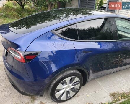 Синий Тесла Model Y, объемом двигателя 0 л и пробегом 63 тыс. км за 26500 $, фото 4 на Automoto.ua