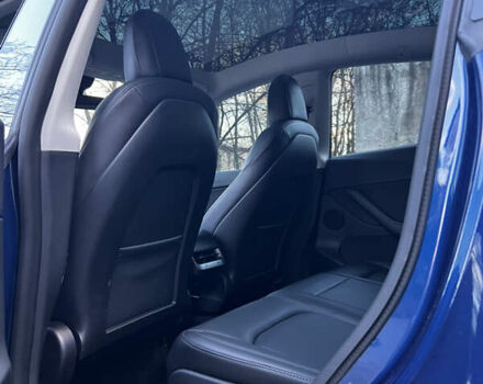 Синій Тесла Model Y, об'ємом двигуна 0 л та пробігом 76 тис. км за 23300 $, фото 16 на Automoto.ua