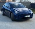 Синий Тесла Model Y, объемом двигателя 0 л и пробегом 80 тыс. км за 27000 $, фото 1 на Automoto.ua