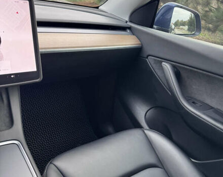 Синий Тесла Model Y, объемом двигателя 0 л и пробегом 52 тыс. км за 30900 $, фото 18 на Automoto.ua