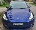 Синий Тесла Model Y, объемом двигателя 0 л и пробегом 63 тыс. км за 26500 $, фото 1 на Automoto.ua