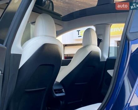 Синий Тесла Model Y, объемом двигателя 0 л и пробегом 92 тыс. км за 31999 $, фото 15 на Automoto.ua